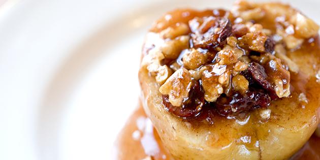Simple desserts: baked apples with walnuts, raisins and honey
