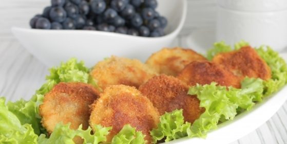 Zucchini stuffed with meat and fried in breadcrumbs