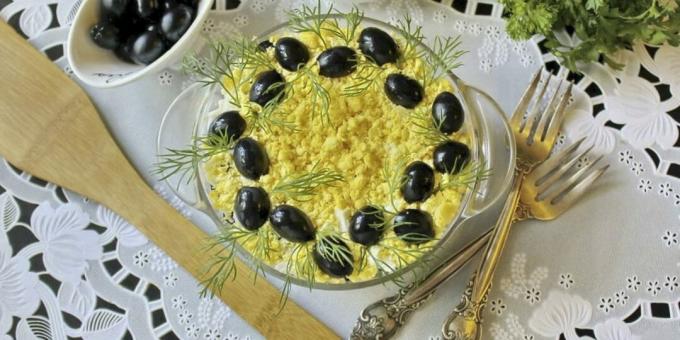 Layered salad with canned fish