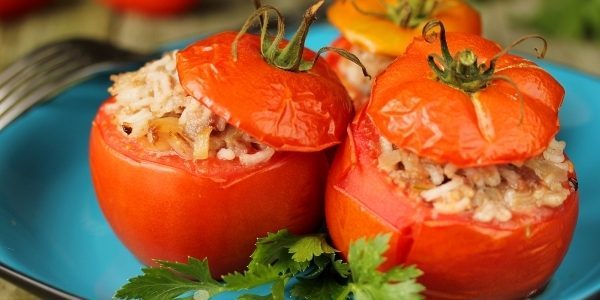 Baked tomatoes stuffed with pork and rice