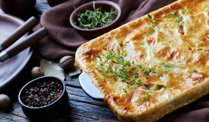 Closed pie with chicken, mushrooms, thyme and sour cream