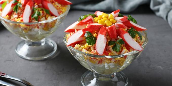 Layered salad with crab sticks and rice