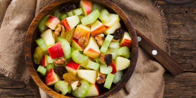 Salad with celery, apple, raisins and nuts