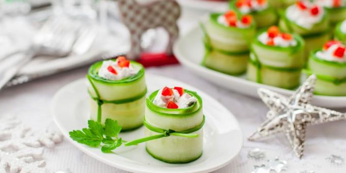 Cucumber rolls with feta, pepper and tomato