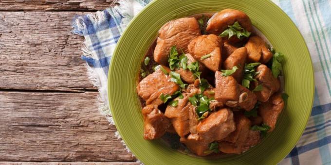 Chicken fillet with garlic and ginger in a frying pan