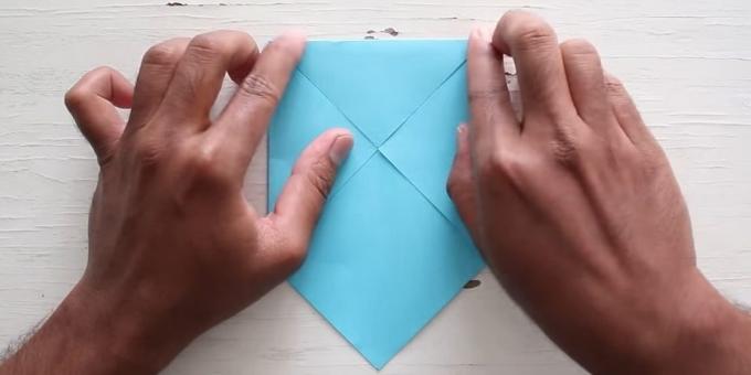 envelope with your hands: Fold the top corner