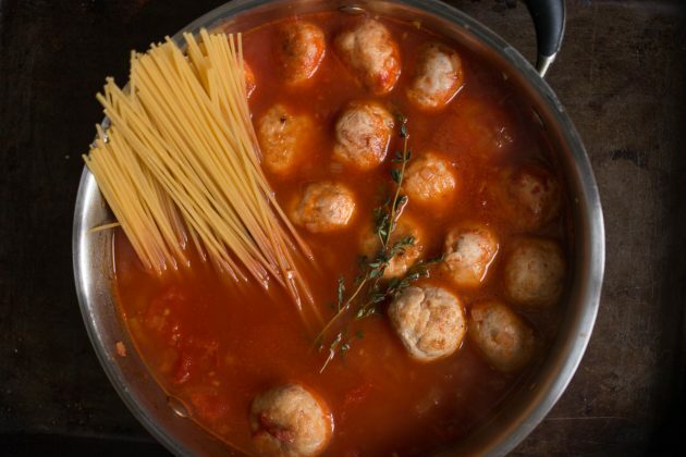 Add spaghetti to the meatballs