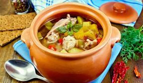Chicken with potatoes, cabbage and pepper in pots