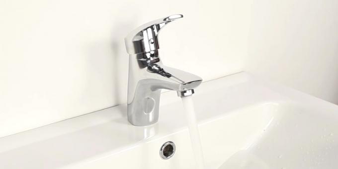 Install faucet on the sink