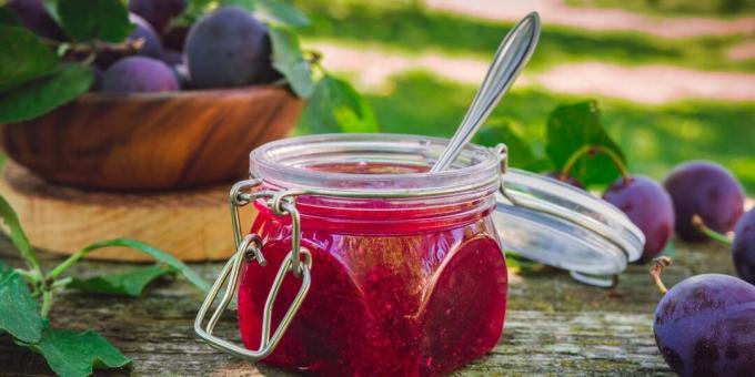 Plum jam with strawberries and rosemary