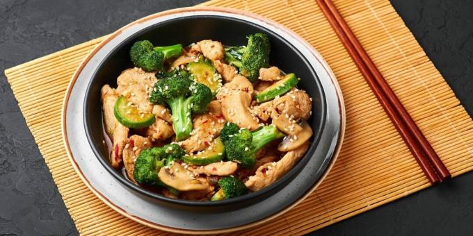 Chicken fillet fried with broccoli, mushrooms and zucchini