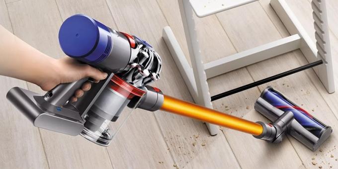 How to choose a vacuum cleaner: Upright vacuum cleaner with a motor and a dust collector in the handle