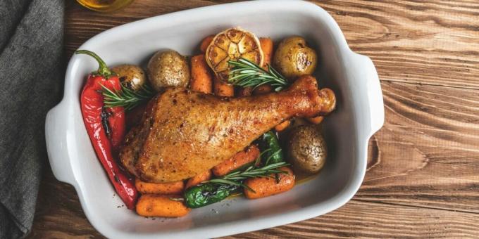 Turkey drumstick baked with vegetables