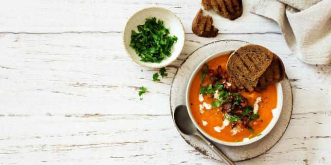 Pumpkin puree soup with bacon and chili