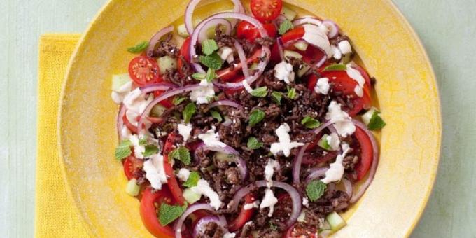 Salad with tomatoes. Salad with tomatoes, cucumbers and beef