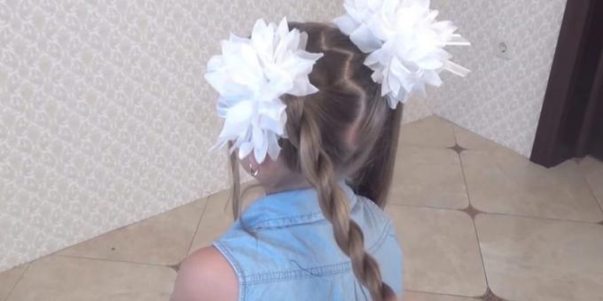 Divide the ponytail into two sections and twist them together