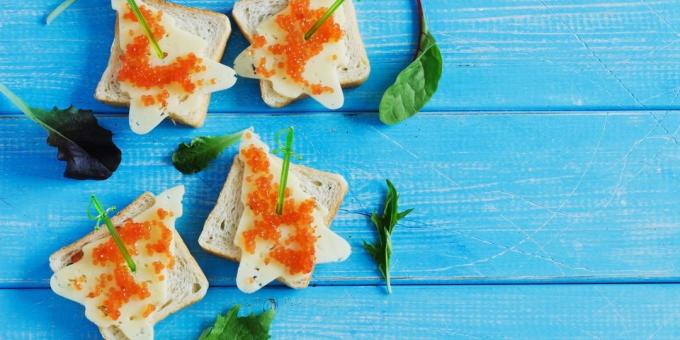 Sandwiches with red caviar and cheese