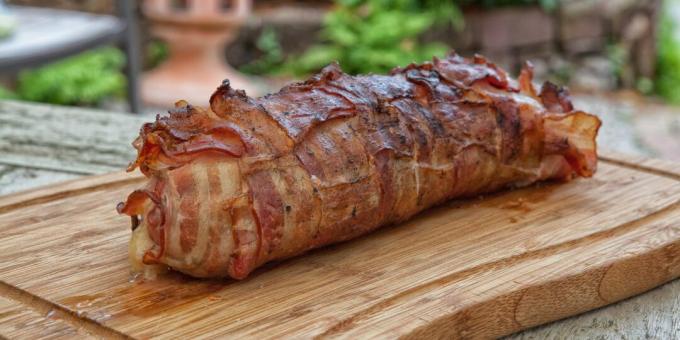 Juicy pork baked in bacon