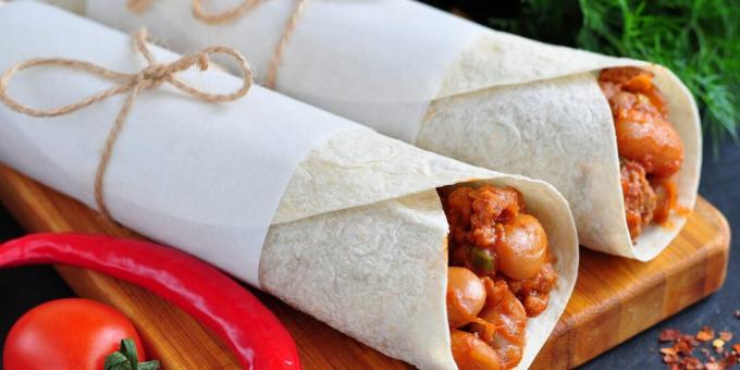 Burrito with chicken, beans and tomatoes