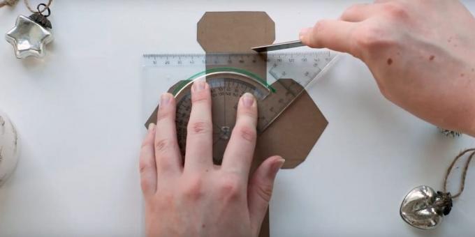 Advent calendar with your own hands: Attach to the line of the dotted lines and walk on them a metal ruler or a knife