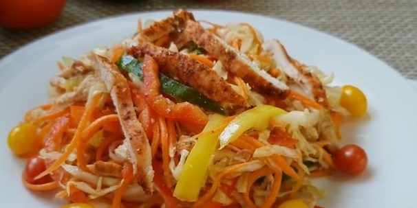 Carrot salad, chicken, cabbage and peppers with soy sauce