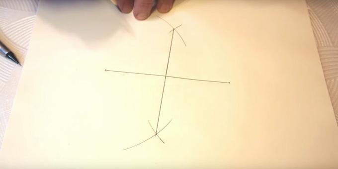 How to draw a five-pointed star: draw a vertical line
