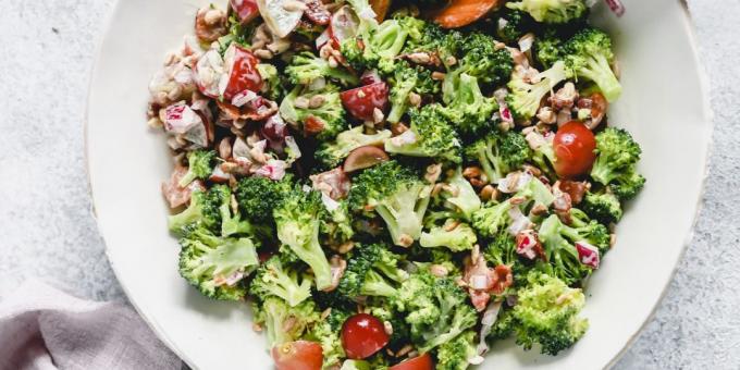Recipe salad with broccoli, bacon, onions, grapes and sunflower seeds