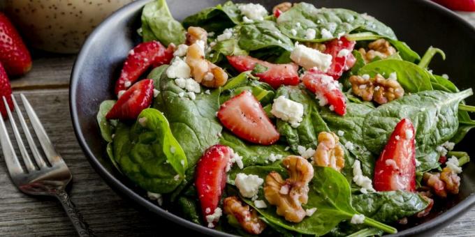 Salad with strawberries, spinach, nuts and feta cheese