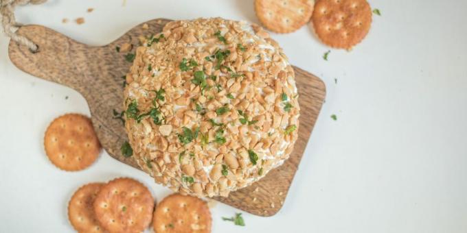 Cheese snack with peanuts and parsley