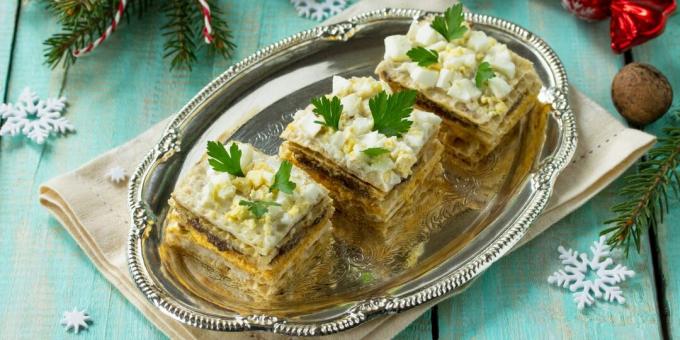 This should be on the holiday table. Snack cake with herring