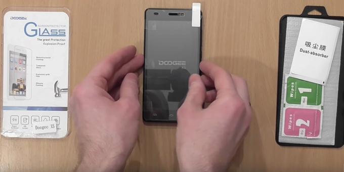 Before you stick the protective glass, try it on your smartphone