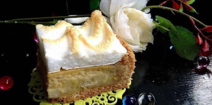 A cake with bananas, sour cream and citrus filling and meringue