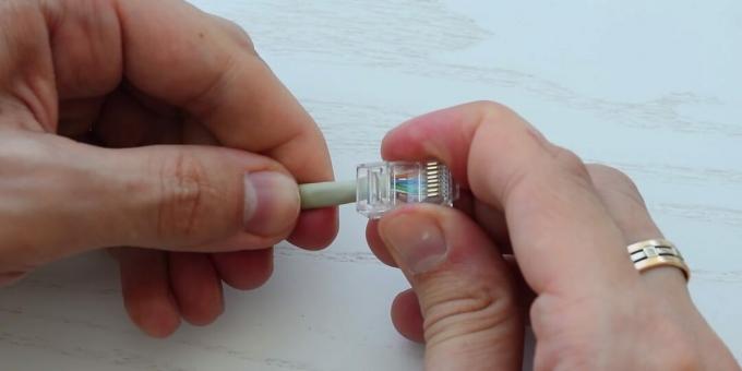 How to crimp a twisted pair cable: Slip on the connector