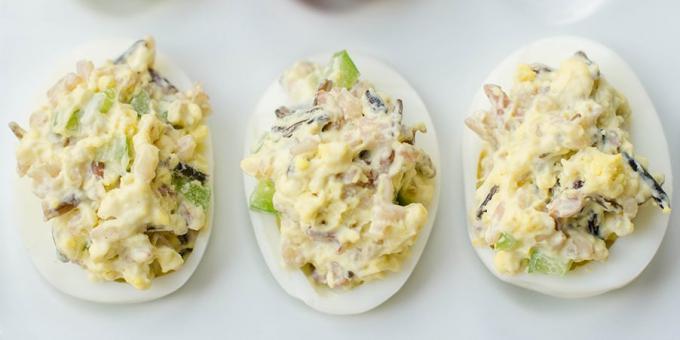 Stuffed eggs with rice and cucumber