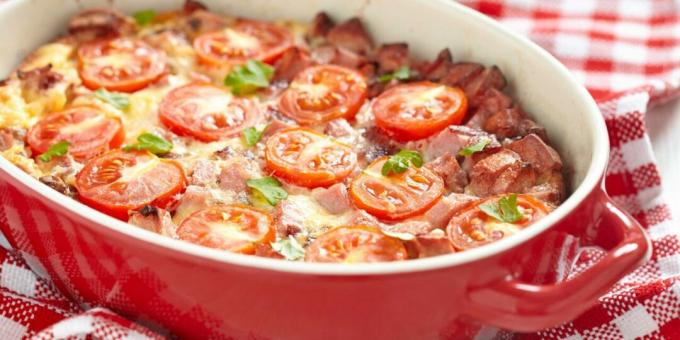 Omelette with sausages and tomatoes in the oven