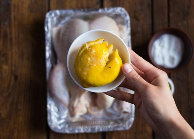 Oven chicken with lemon: Add lemon