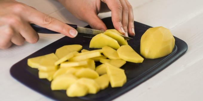 Peel the potatoes and cut into slices