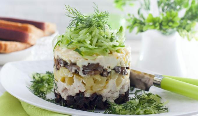 Chicken salad with mushrooms and prunes