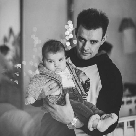 Mikhail Frolov, with a daughter