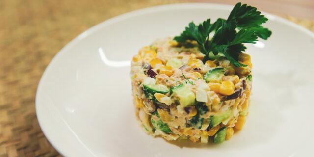 Salad with tuna, eggs, cucumbers and corn