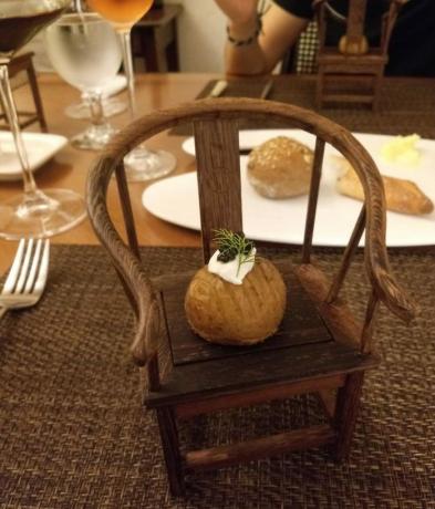 serving potatoes on a highchair