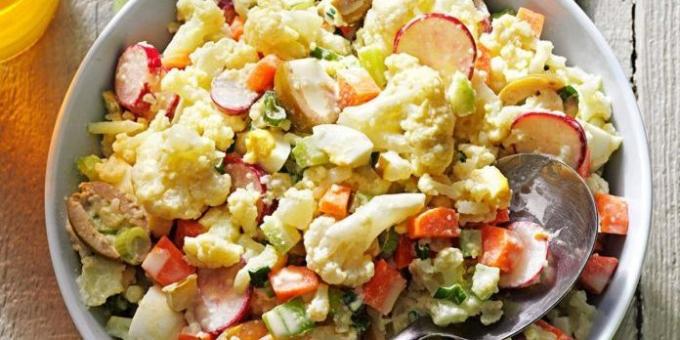 Salad with eggs, cauliflower, olives and radishes