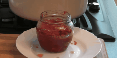 Filling for borscht for the winter: Lay the hot filling of sterilized jars
