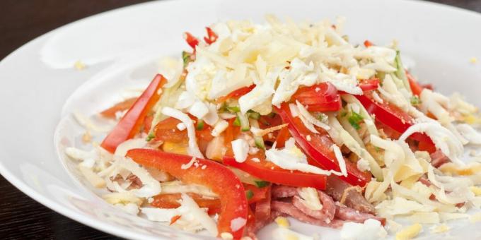Salad with smoked sausage, cheese and pepper