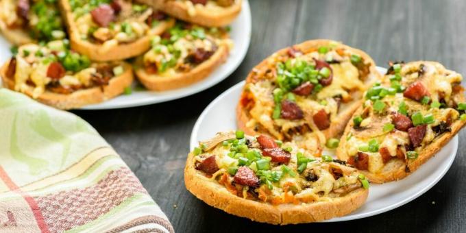 Hot sandwiches with sausage, mushrooms and cheese