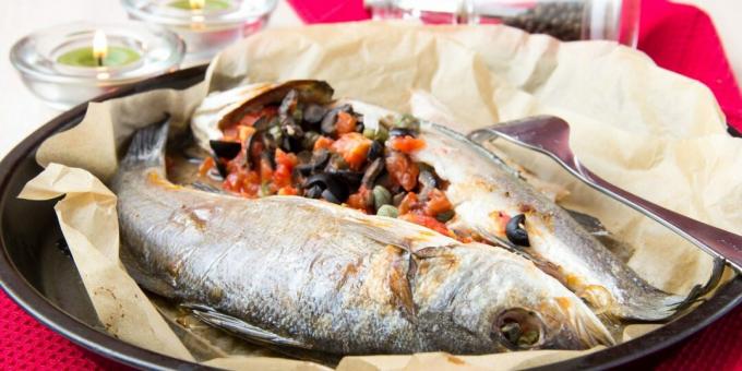 Sea bass baked with olives, tomatoes and fennel