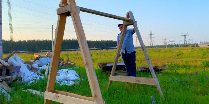 On the cross member at the top of the letter "A" put a piece of board 200 × 50 2 m and nail