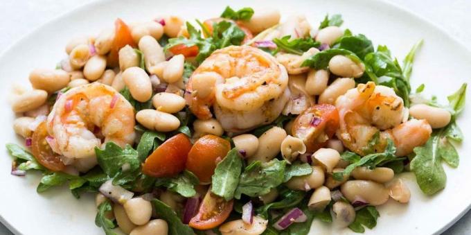 Salad with tomatoes. Salad with tomatoes, shrimp and beans