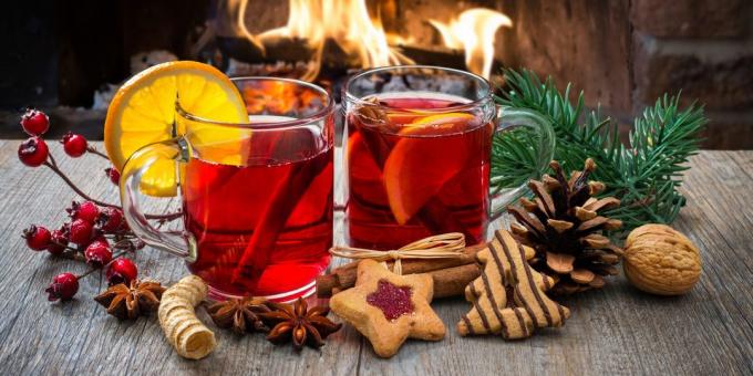 Non-alcoholic mulled wine on the cranberry and apple juice with orange syrup