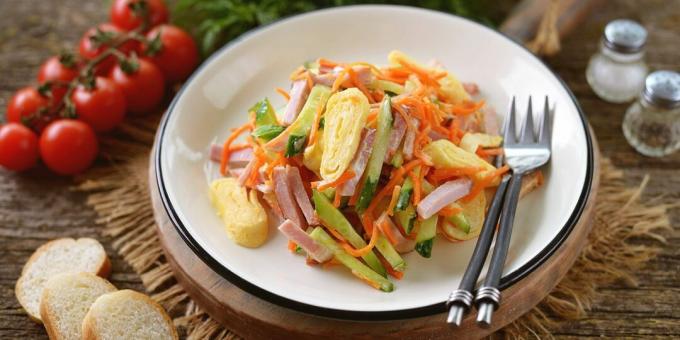 Salad with Korean carrots, egg pancakes and ham